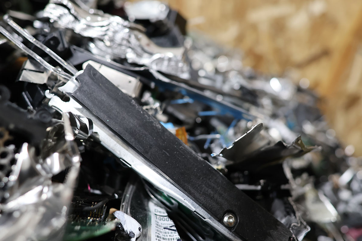3. Shredded hard drive particles after certified data destruction